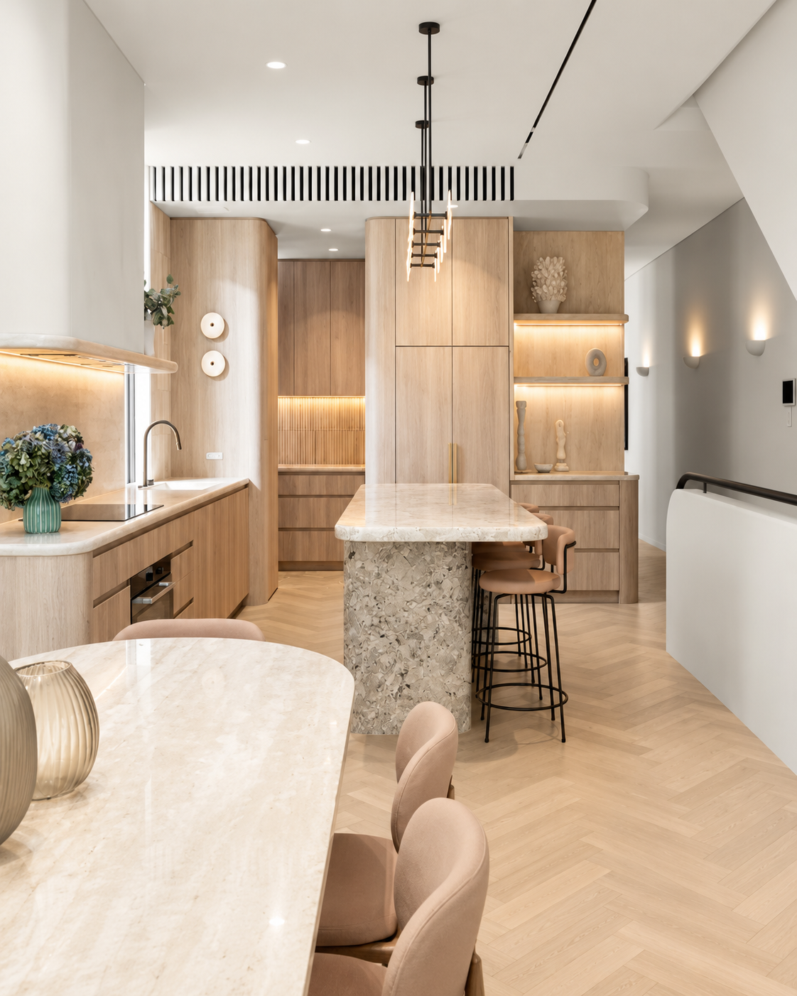 Open-plan designer kitchen with premium stone benchtops